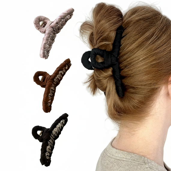 schwarze Haarklammer in rotem Haar 
links daneben rose, braune und schwarze Haarklammer abgebildet